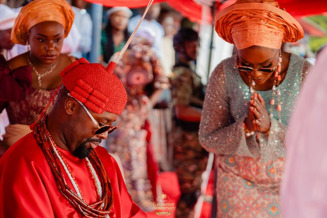 Regatta flotilla — coloured vessels en route to Big Warri